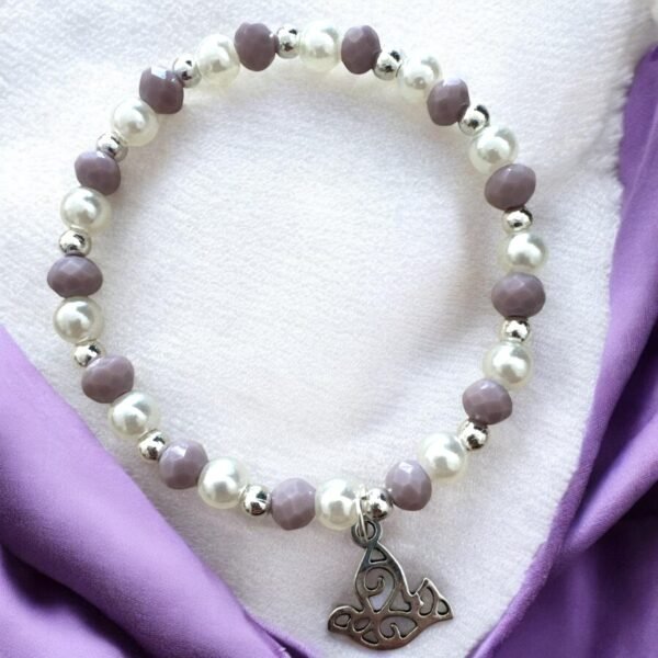 detalle de Pulsera de Bautizo con Dije de Paloma – Recuerdo Tierno y Colorido para tu Evento Especial. Set 10 piezas.